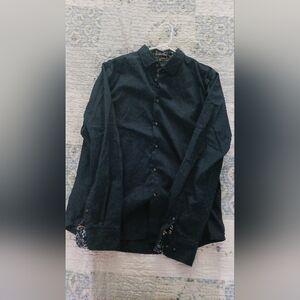 dark blue long sleeve shirt with white dots